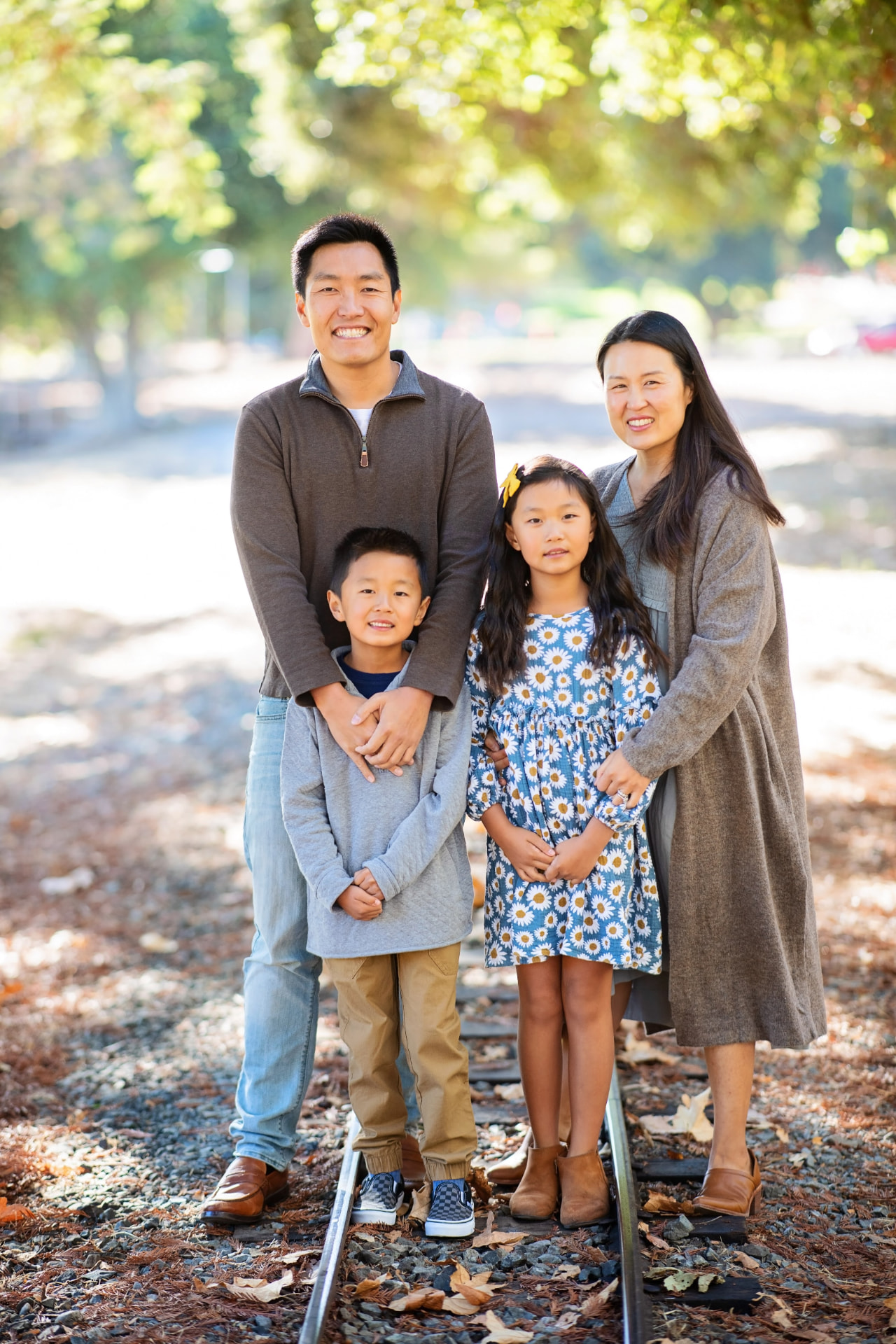 Charles Hsieh with his family outdoors